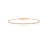 Vue latérale du bracelet Clémence en or rose, montrant les diamants en serti pavé.