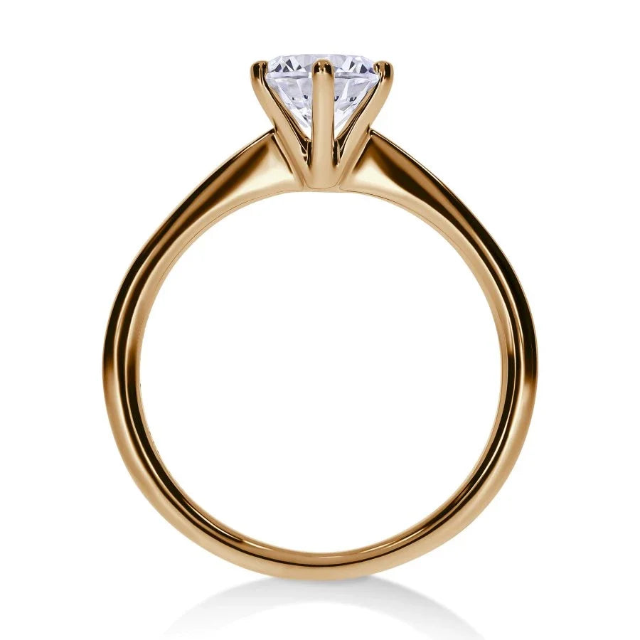 Profil de la bague Solitaire Pur en or jaune, brillance du diamant GIA mise en valeur.