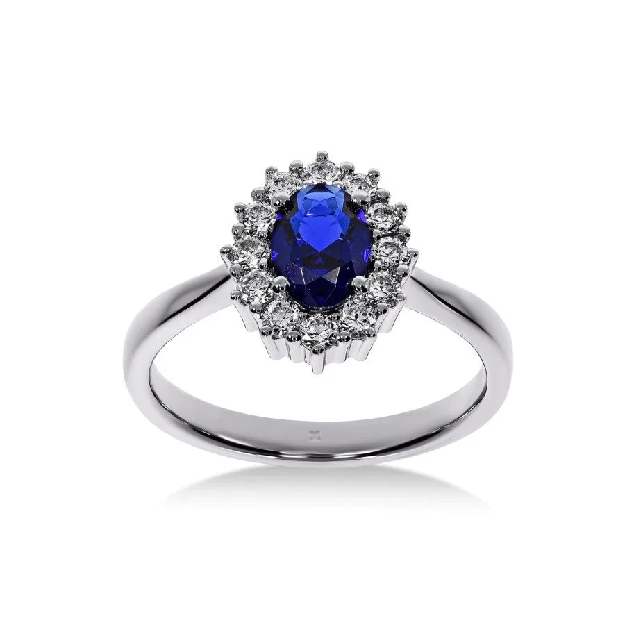 Bague de fiançailles Saphir Impérial en or jaune avec saphir bleu de 2,55 carats et halo de diamants, vue de face.