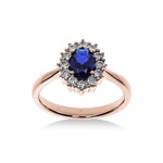 Bague de fiançailles Saphir Impérial en or rose avec saphir bleu de 2,55 carats et halo de diamants, vue de face.