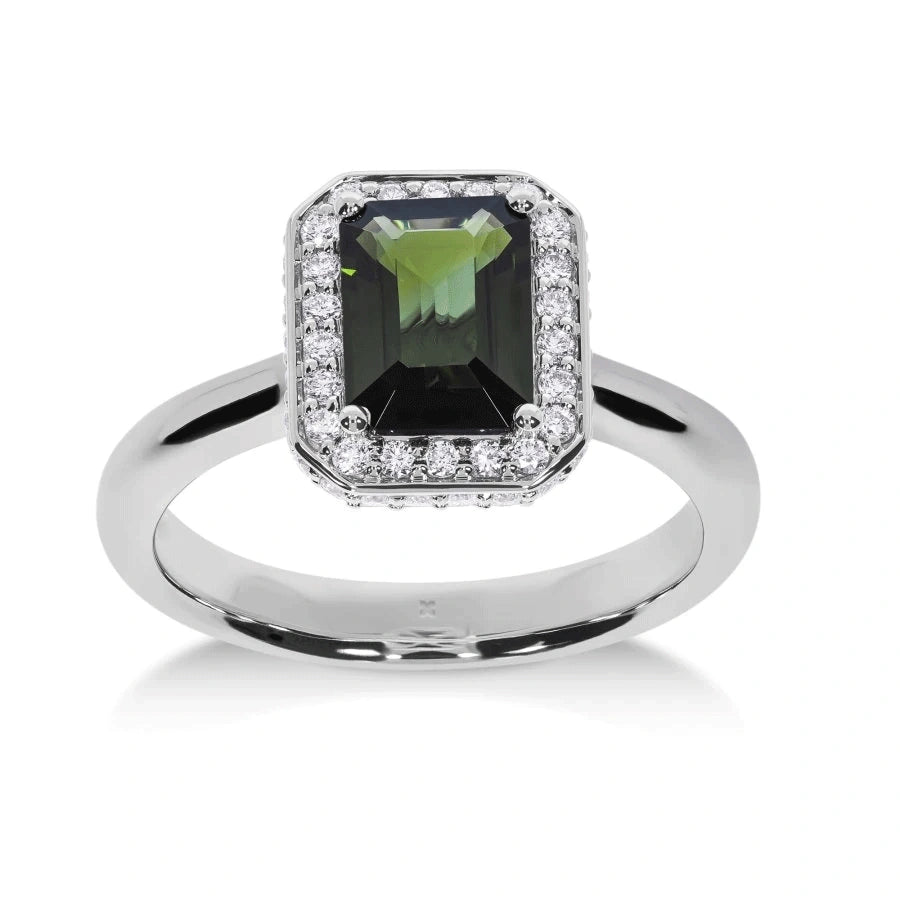 Bague de fiançailles Symbole en or blanc avec tourmaline verte et halo de diamants, vue de face