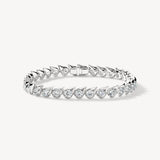 Bracelet Maasai en or blanc 18K serti de 6.40 carats de diamants naturels, haute joaillerie LeDiamanti.