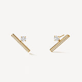 Boucles d’oreilles en or jaune avec diamant taille rond, modèle Silhouette Grande, vue de face révélant le design minimaliste